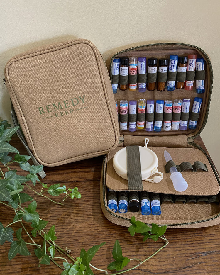 Homeopathic storage kit filled with 42 remedy tubes.